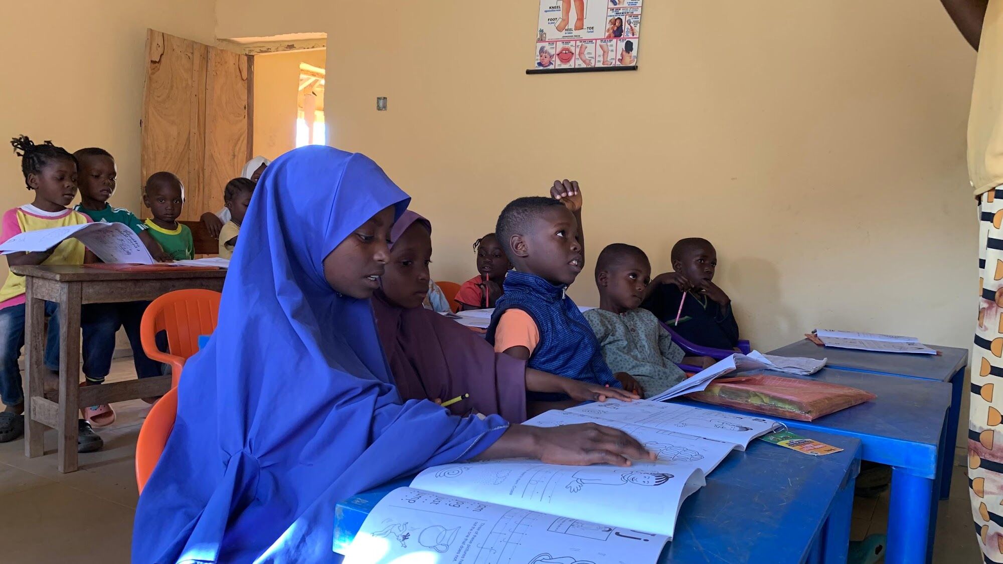 A learner reading in class